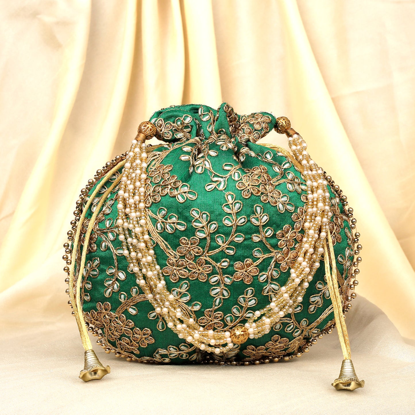 The Golden Amulet Green Potli