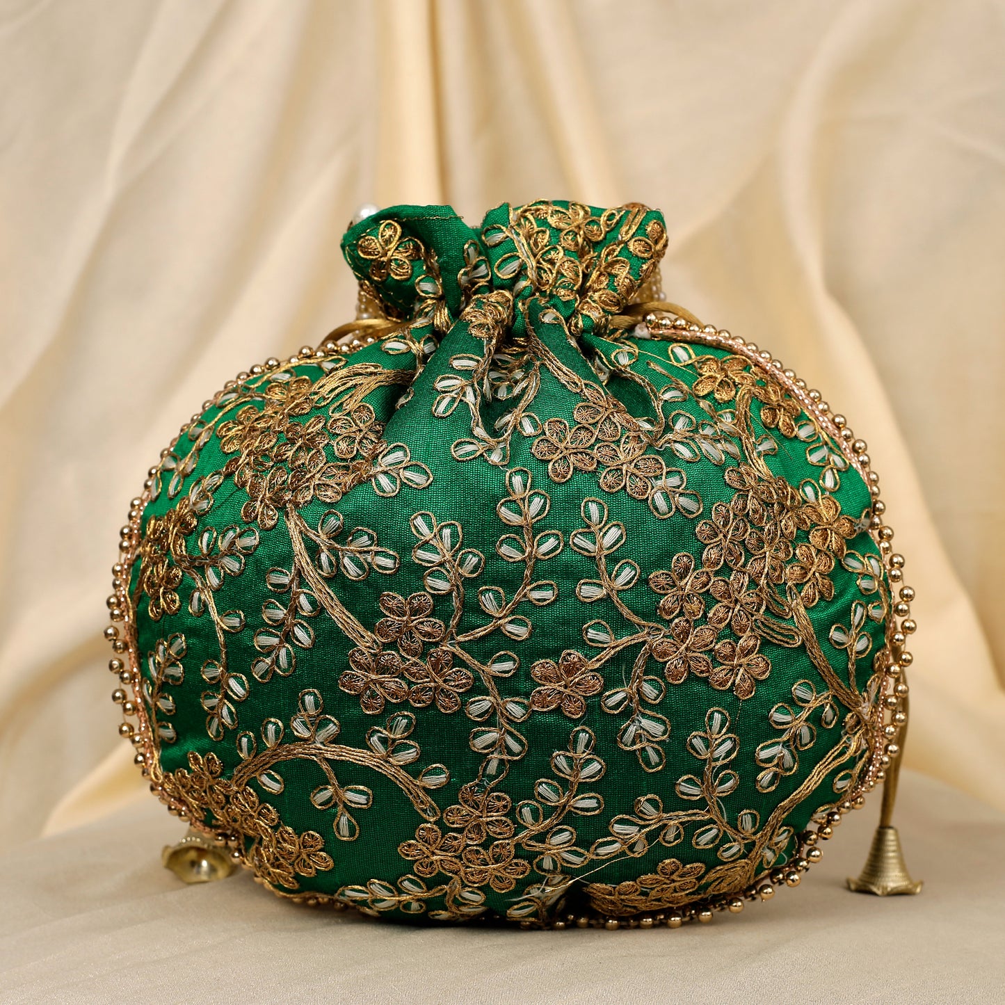 The Golden Amulet Green Potli