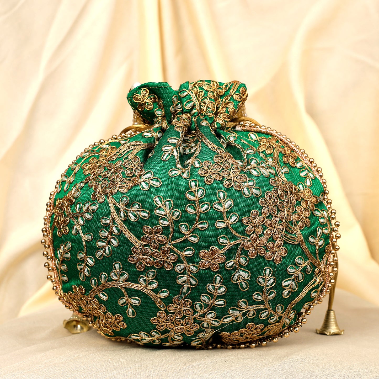 The Golden Amulet Green Potli