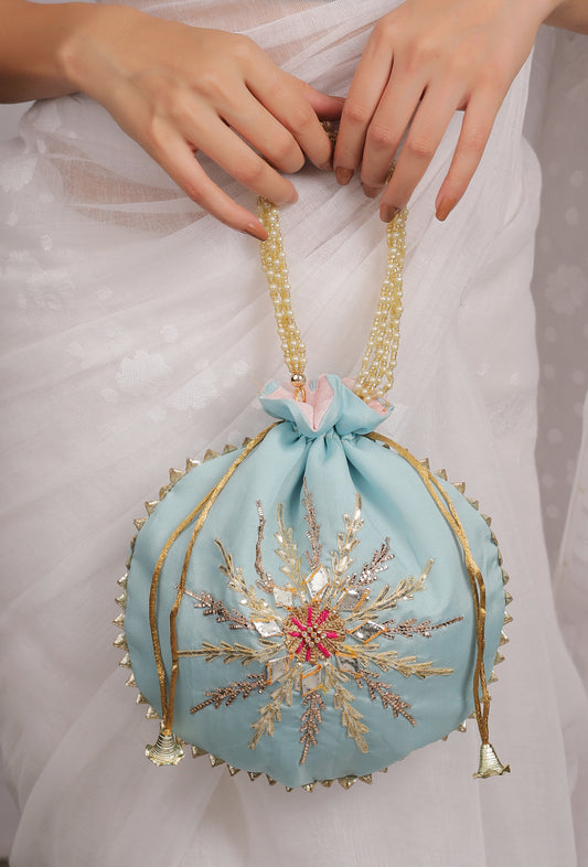 The Fernista Scarlet Potli in Powder Blue