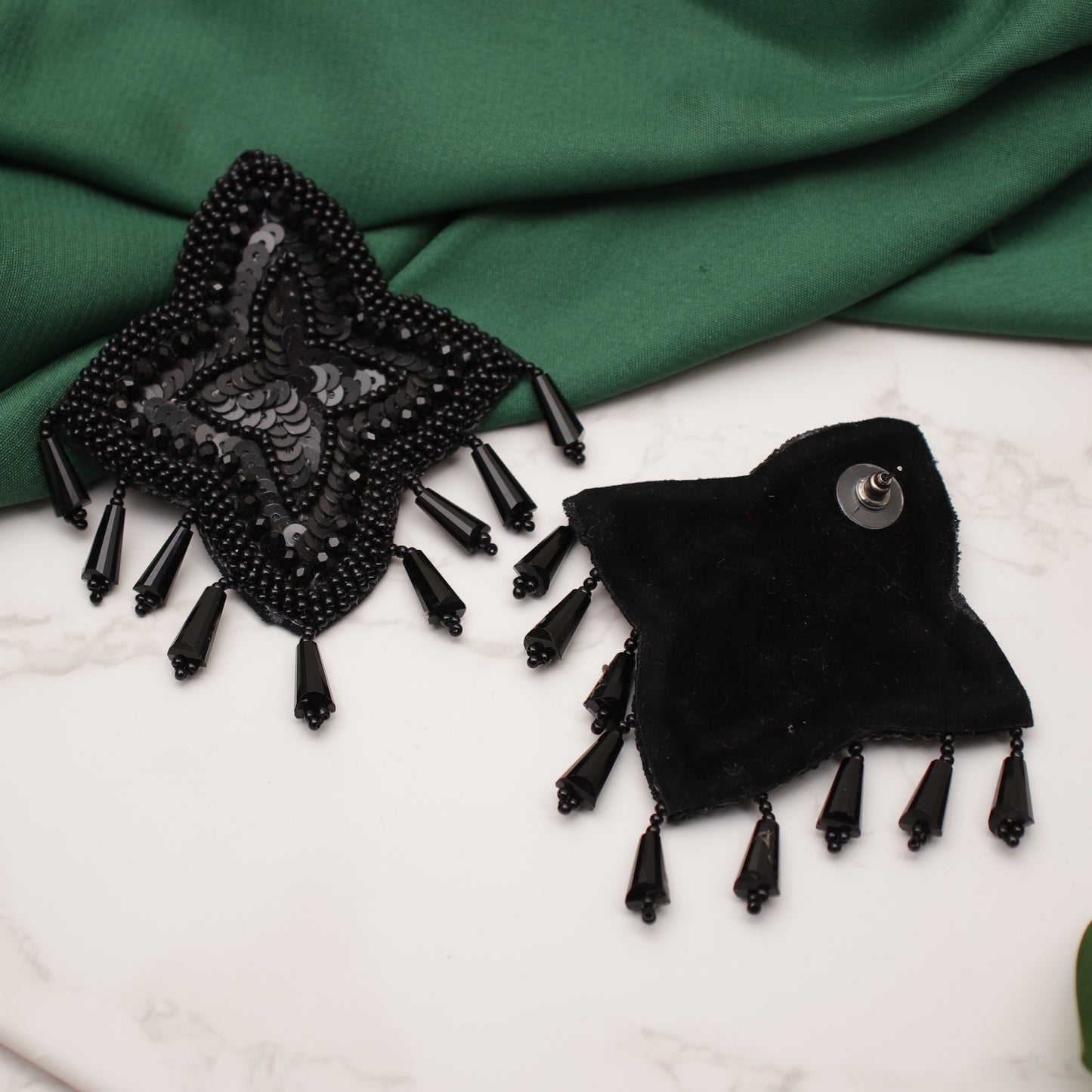 The Black Trinky Sea Star Earrings