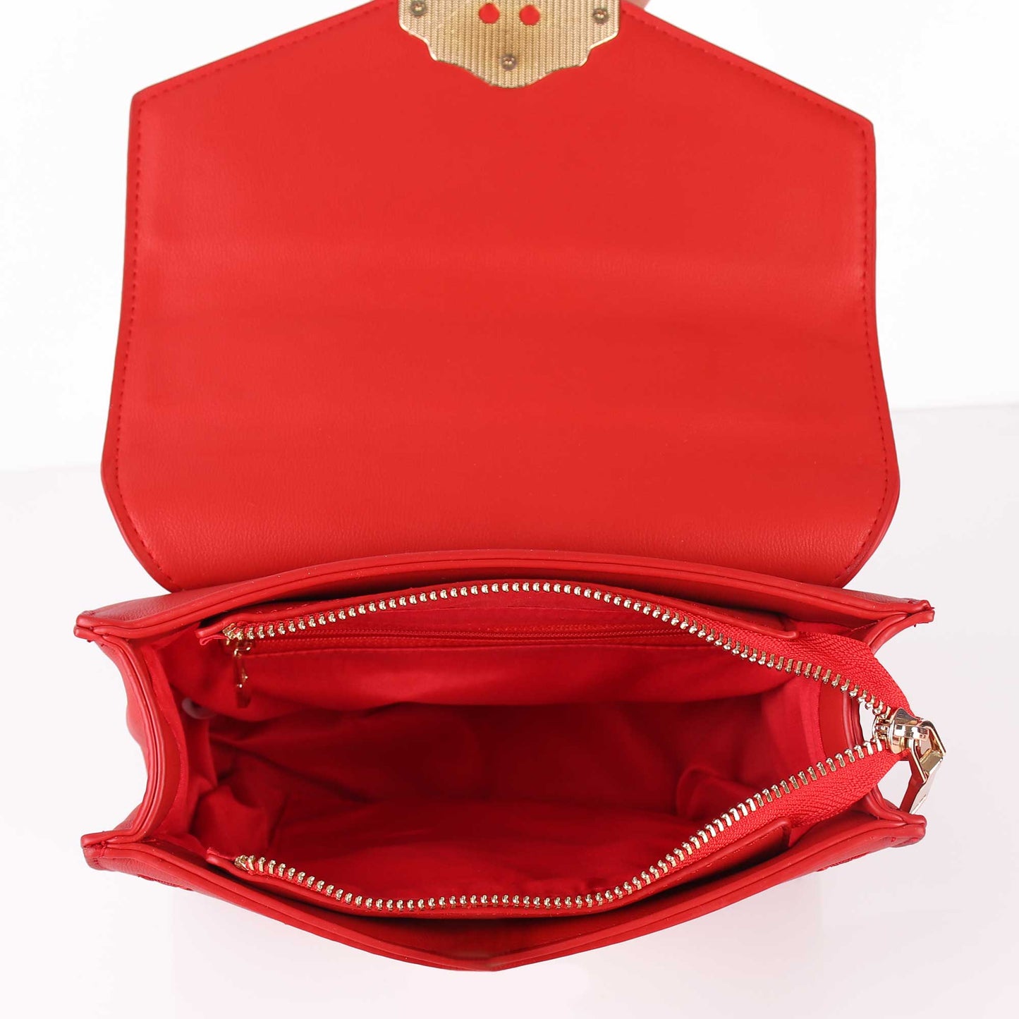 The Punched Sling Bag in Red