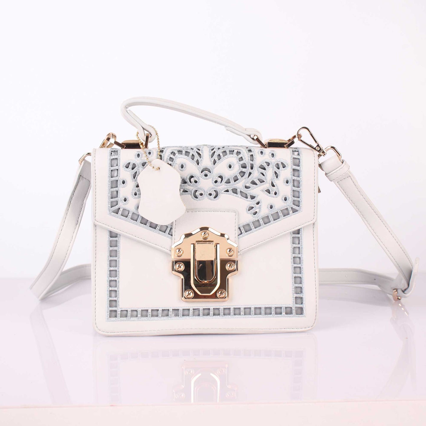 The Punched Sling Bag in White