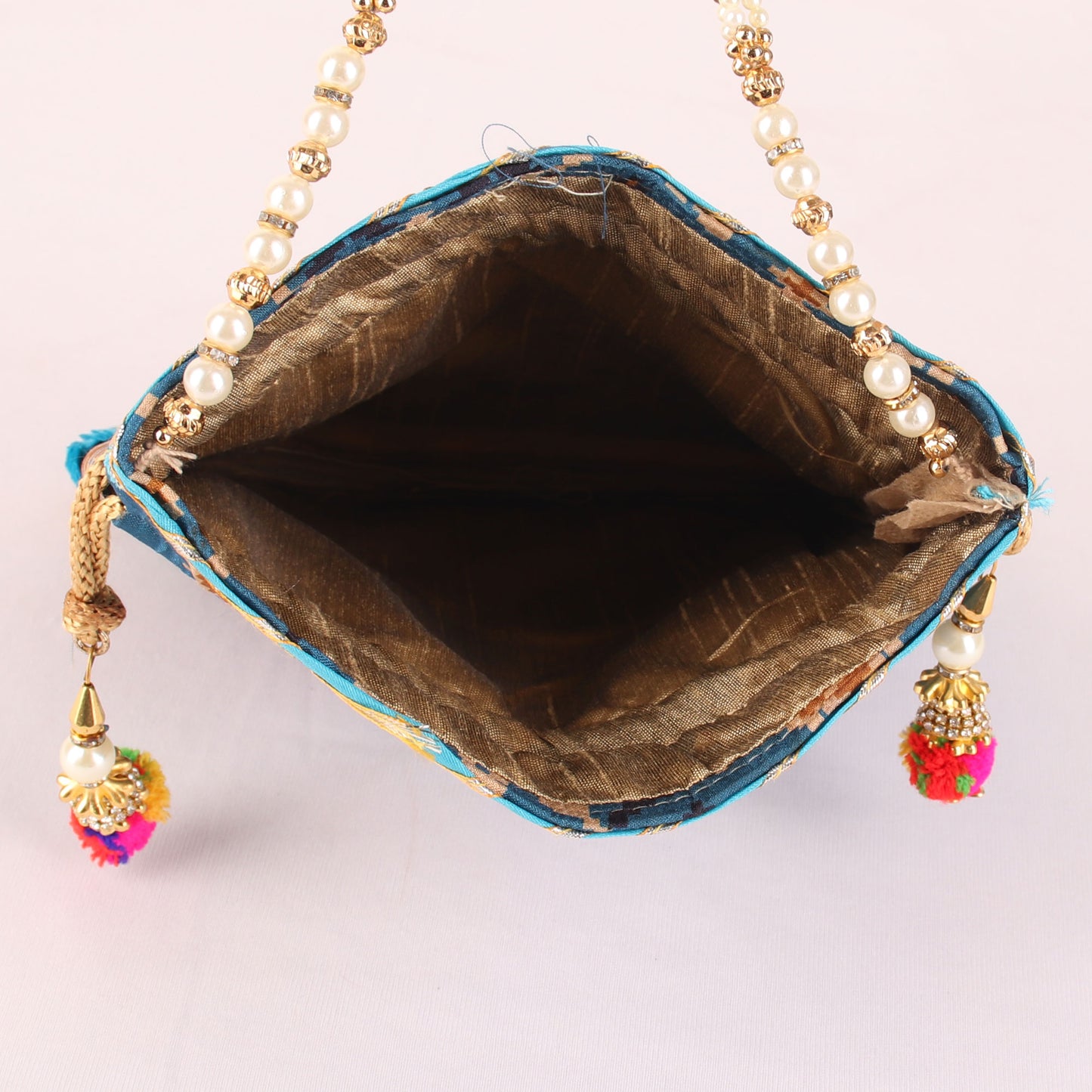 Potli,Glitter embellished Blue Ikat Print Potli - Cippele Multi Store