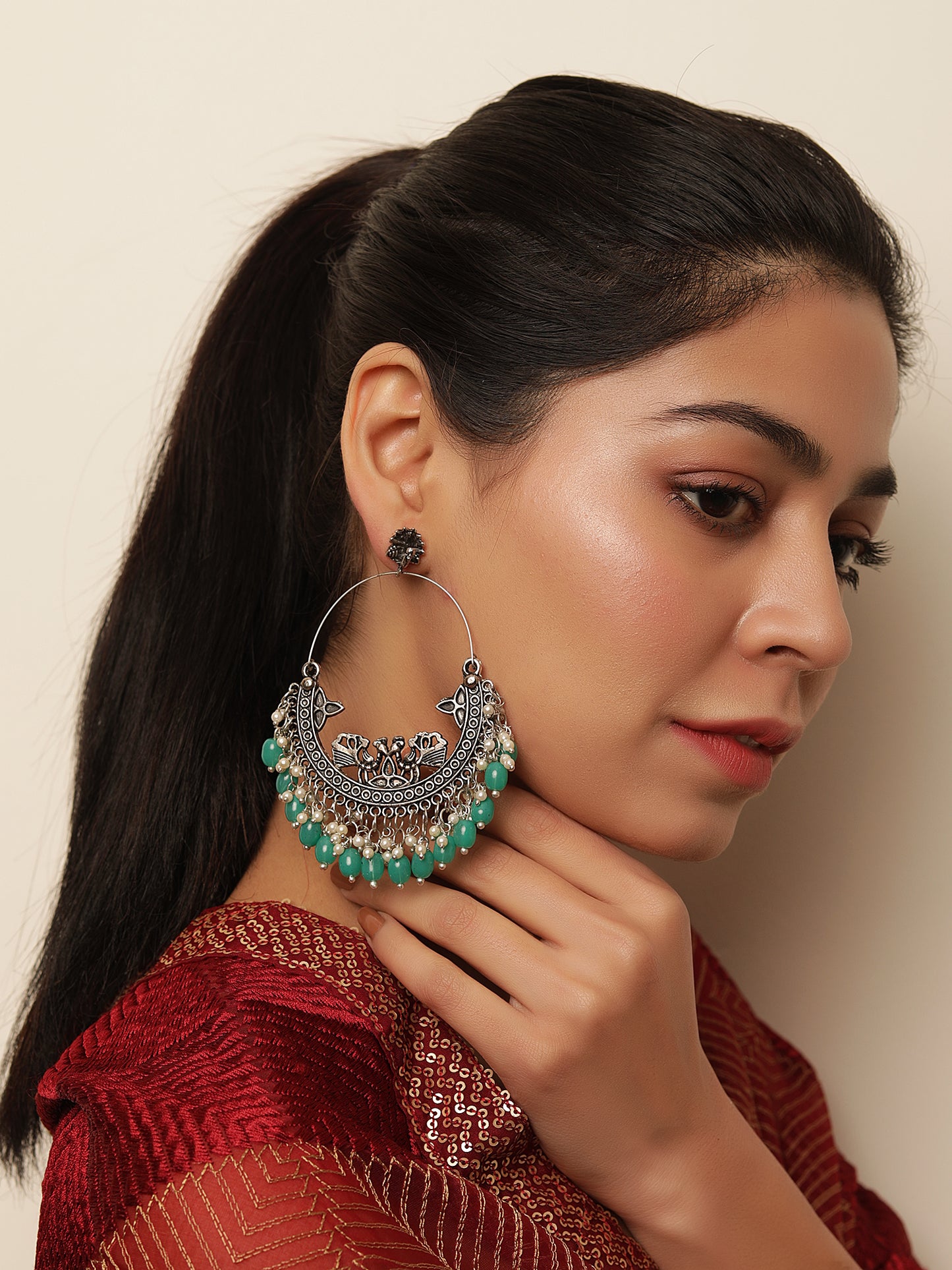 The Trinkly Love Bird Earrings with Green Beads