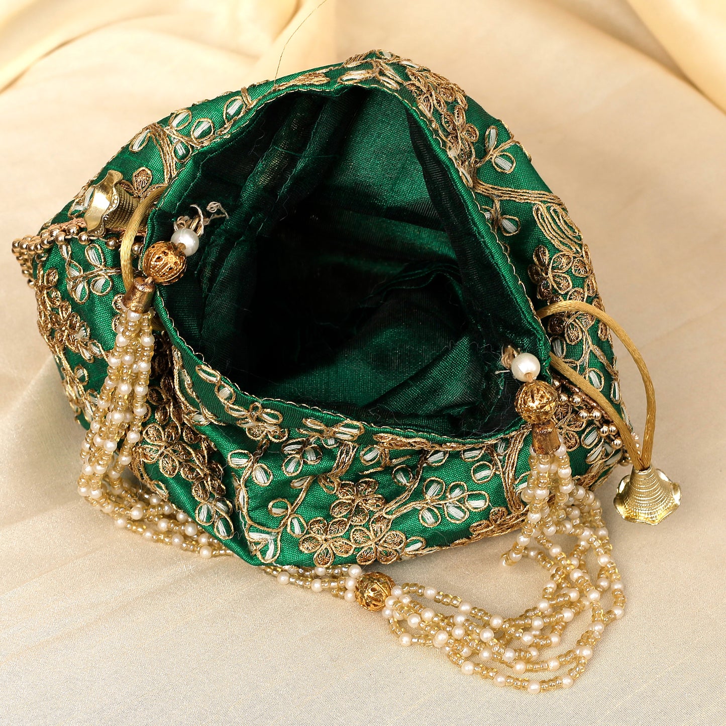 The Golden Amulet Green Potli