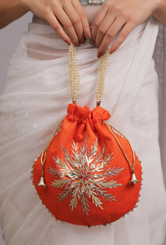 The Fernista Scarlet Potli in Orange