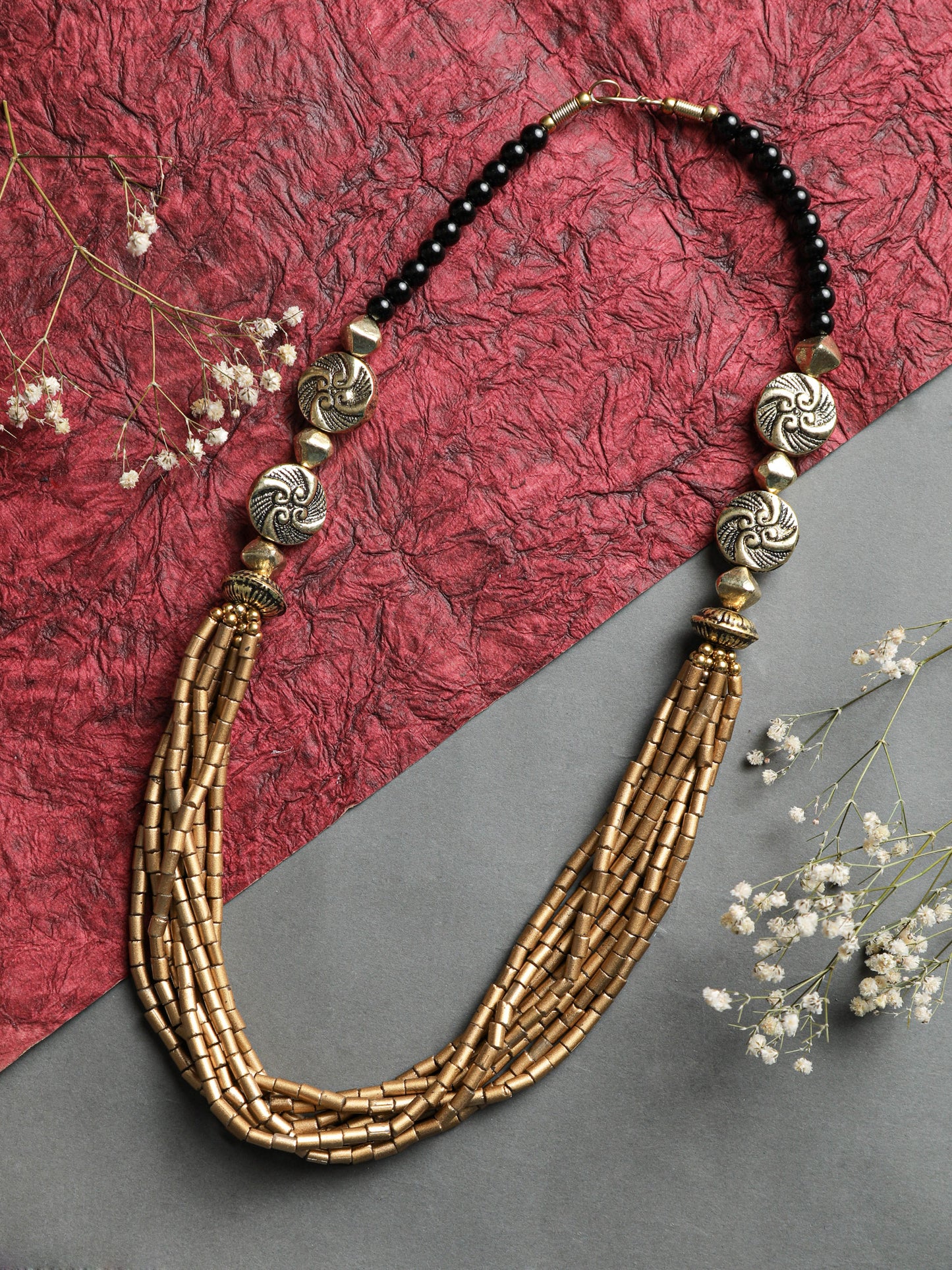 The Multi Layered Cluster Barrel Necklace in Golden