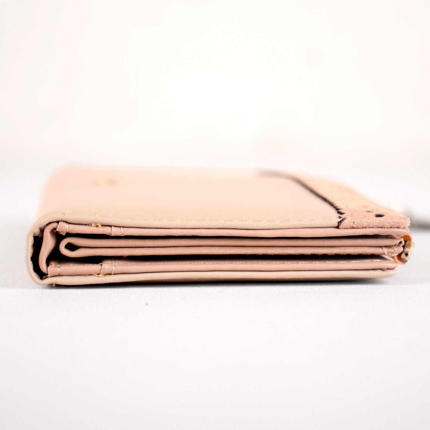 The Punched Ribbon Wallet in Nude