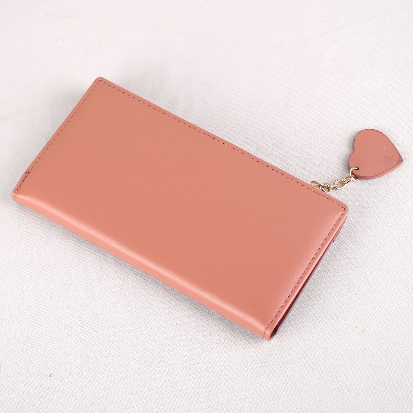 The Punched Ribbon Wallet in Pink