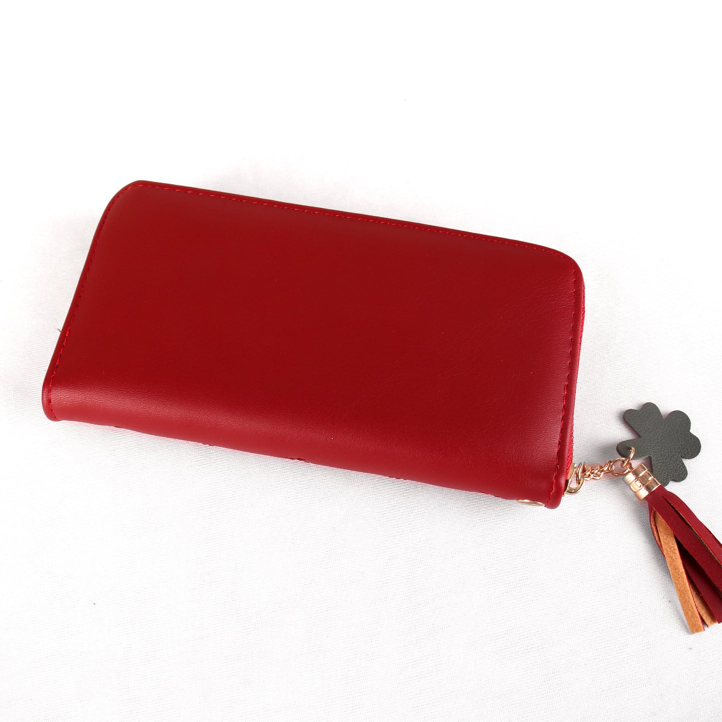 The Boxy inverted Clamped wallet with Tassels in Maroon