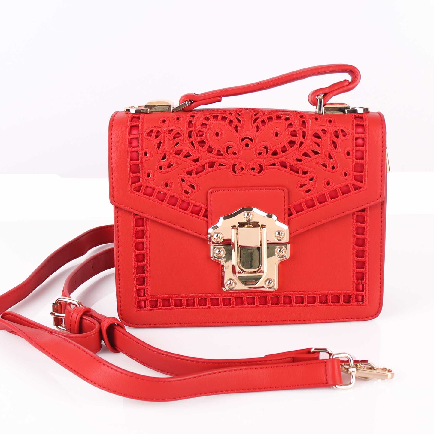 The Punched Sling Bag in Red