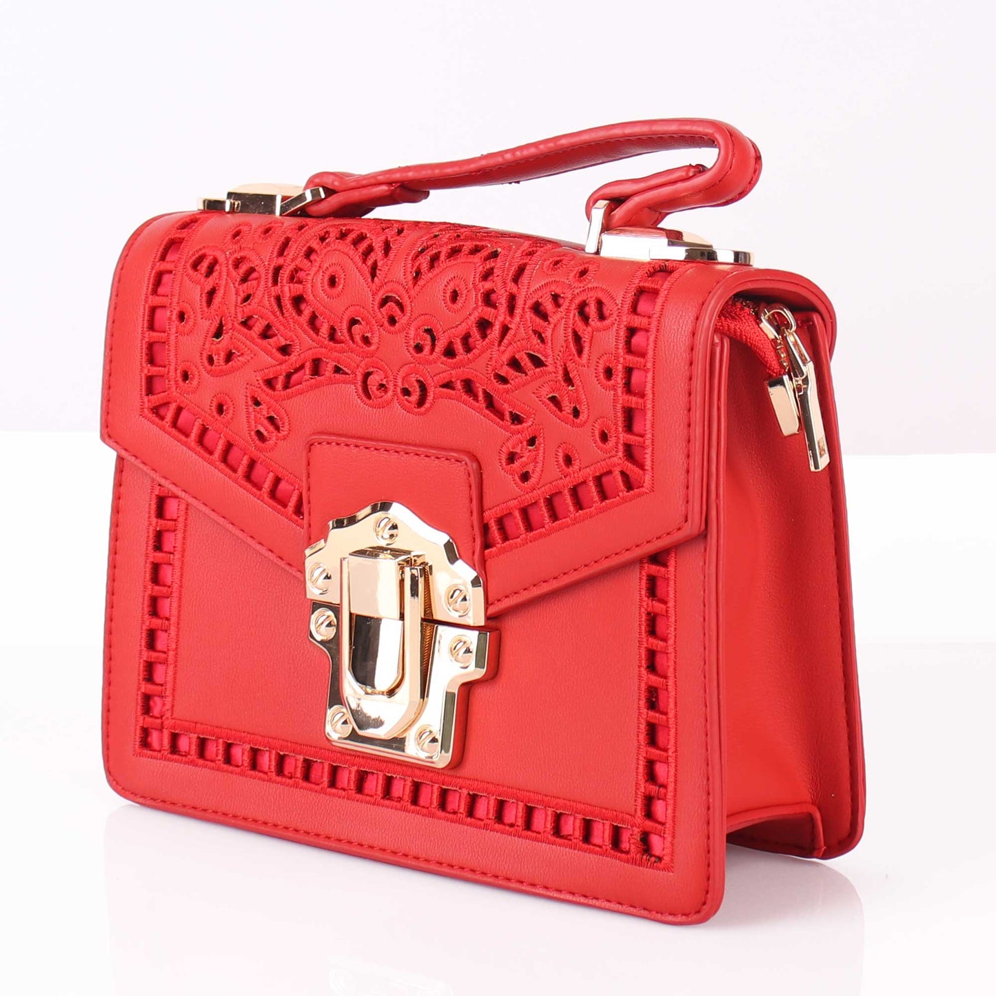 The Punched Sling Bag in Red