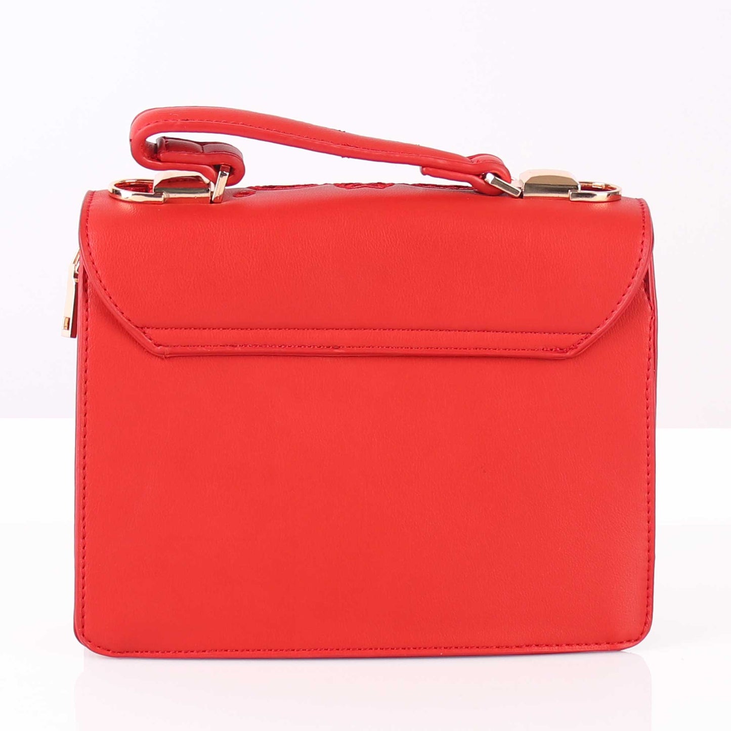 The Punched Sling Bag in Red